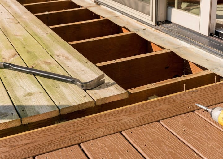 Deck repairs are being made to a deck on a Miami residential property.